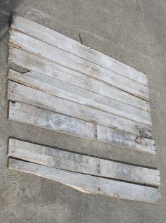 an old wooden pallet sitting on the ground