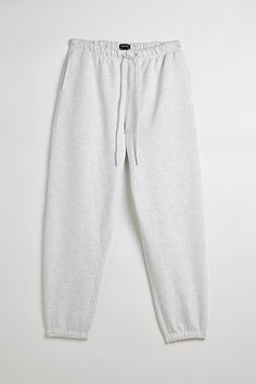 Longline stacked sweatpants by Standard Cloth in a heavyweight cotton fabrication. Essential jogger look with gathered ankle cuffs and an adjustable drawstring waistband. Urban Outfitters exclusive. Features Standard Cloth Jump Shot stacked sweatpants Jogger style sweatpants Mid rise waist Adjustable drawstring Gathered ankle cuffs UO exclusive Content + Care 100% Cotton Machine wash Imported Size + Fit Model in Black is 6’1.5" and wearing size Medium Measurements taken from size Medium Rise: 12 Sweats Men, Urban Cotton Tapered Leg Sweatpants, Urban Sweatpants With Multiple Pockets, Urban Straight Sweatpants With Side Pockets, Urban Style Cotton Full-length Sweatpants, Sweat Pants, Urban Full-length Cotton Sweatpants, Style Sweatpants, White Sweatpants