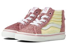 Vans Kids Sk8-Hi Zip (Infant/Toddler) - Girls Shoes : Glitter Two-Tone : Tiny toes deserve timeless style! Set her first steps up for success with the tried and true Vans Kids Sk8-Hi Zip sneakers! High-top silhouette. Available in a variety of adorable, patterned textile uppers, depending on colorway. Elasticized laces and back zip closure for easy on and off. Iconic side wall stripe. Triple-stitched, padded collar for all-day comfort. Smooth textile lining for all-day wear. Vulcanized midsole p Shoes Glitter, Striped Walls, Vans Kids, Toddler Girl Shoes, Shoes Vans, Sneakers Athletic, Glitter Shoes, Side Wall, Sk8 Hi