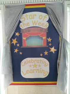 a sign that says star of the week and celebrating learning with stars hanging from it's sides