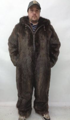 BEAUTIFUL AND VERY STYLISH BROWN BEAVER FUR SNOWSUIT FOR MEN! COMPLETED WITH FIXED HOOD, FRONT ZIPPER CLOSURE AND 2 SIDE POCKETS! THIS ITEM IS BRAND NEW, MADE TO MEASUREMENT.  PLEASE LET US KNOW YOUR HEIGHT, WEIGHT, CHEST CIRCUMFERENCE AND LENGTH OF THE SNOWSUIT YOU WANT SO THAT WE CAN PRODUCE THE SUIT THAT FITS YOU. THANK YOU! MEASUREMENTS:   SIZE: WILL BE MADE TO MEASUREMENTS WHY YOU SHOULD BUY YOUR PRE-OWNED FURS ONLY FROM OUR COMPANY? BECAUSE WE SIZE AND REPAIR OUR COATS BEFORE SHIPPING AND WE OFFER A RETURN POLICY...NO RISK 100% SATISFACTION. BRAND NEW COATS: ONCE MEASUREMENTS ARE RECEIVED (HEIGHT,WEIGHT, CHEST/BUST, SLEEVE LENGTH AND LENGTH OF THE COAT WANTED), YOUR BRAND NEW FUR WILL BE MADE TO MEASUREMENT AND WE CAN GUARANTEE PERFECT FIT, AS A PATTERN WILL BE MADE TO THE SIZE NEEDE Coyote Fur, Mens Fur, Fur Coat Men, Jumpsuit Men, Snow Suit, Leather Men, Vest Jacket, Front Zipper, Fur Coat