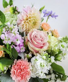 a bunch of flowers that are sitting on a table