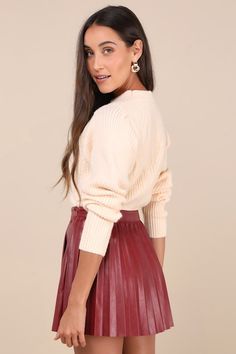 The Lulus Chic Edge Burgundy Vegan Leather Pleated High-Rise Mini Skirt calls in admirers all day long! Smooth vegan leather shapes this stylish skirt with a high, banded waist and an A-line silhouette with a classic pleated design. Perfect mini hem completes the look. Hidden side zipper/clasp. Pair to perfection with your favorite knee-high boots! Fit: This garment fits true to size. Length: Mid-thigh. Size medium measures 15.50" from waist to hem. Waist: Fitted - very fitted at natural waist. Maroon Skirt Outfit, Red Leather Skirt Outfit, Burgundy Skirt Outfit, Anna Herrin, Boots Fit, Stylish Skirts, Bubble Skirt, Leather Mini Skirt, Skirt Outfit