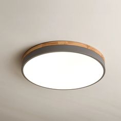 a circular light fixture mounted on the wall