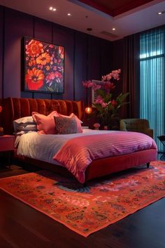 a large bed sitting next to a window in a room with purple walls and wooden floors