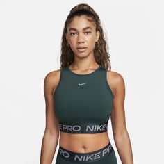 Add a bit of sparkle to your workout in this snug cropped tank. Stretchy, sweat-wicking fabric works with you through every move, while the classic Nike Pro chest band helps keep you feeling bold and secure—so you can shine the whole way through. Deep Jungle, Nike Crop Top, Cropped Tops, Women Lifestyle, Nike Pros, Cropped Tank Top, Crop Tank, Active Wear For Women, Shinee