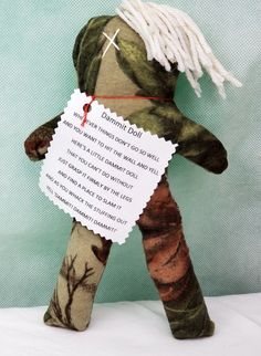 a stuffed animal with a note attached to it