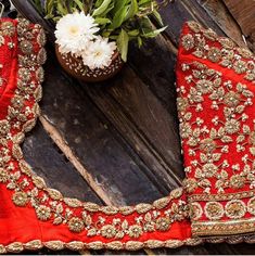 Raw silk Orange Maggam work blouse with zari and stone work | Etsy Work Blouse Hand Designs, Red Blouse Design, Bridal Blouses, Blouse Works, Cutwork Blouse, Wedding Saree Blouse Designs, Cutwork Blouse Designs, Maggam Works