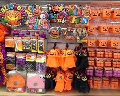 there are many halloween items on display in the store