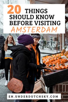 two women looking at pumpkins in an outdoor market with text overlay that reads 20 things you should know before visiting amsterdam