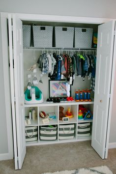 the closet is organized and ready to be used as a baby's nursery room