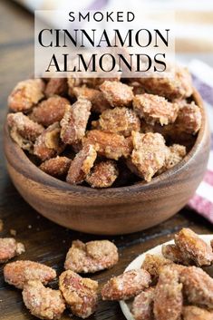 a wooden bowl filled with cinnamon almonds