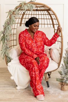 Tis' the season to be jolly! This adorable pajama top has a bold red color with a festive pattern that is just in time for the season! The comfy, figure flattering fit is perfect for lounging around! Throw on some matching bottoms and sip some eggnog in this beauty! 65% Cotton, 25% Polyester, 10% Spandex Red Relaxed Fit Sleepwear For Bedtime, Red Relaxed Fit Sleepwear For Pajama Party, Cozy Red Long Sleeve Sleepwear, Red Fall Sleepwear, Red Sleepwear For Fall, Red Holiday Sleepwear For Sleepovers, Red Holiday Sleepwear For Sleepover, Cozy Red Sleepwear For Sleepover, Cozy Red Sleepwear