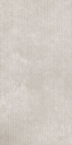 an image of a white textured wallpaper with vertical lines on the bottom and sides