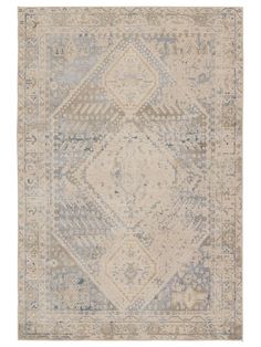 a beige and blue rug with an ornate design