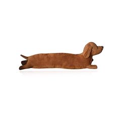 a wooden dachshund laying on its side