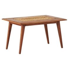 a wooden table with a woven top and two legs on the bottom, against a white background