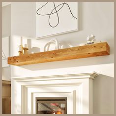 a wooden shelf above a fire place in a room with white walls and flooring