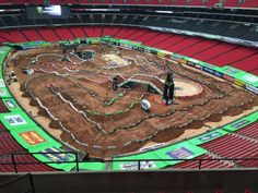 a dirt bike track in the middle of an arena