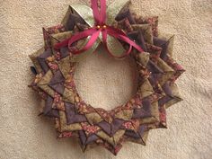 a decorative wreath is hanging on the wall