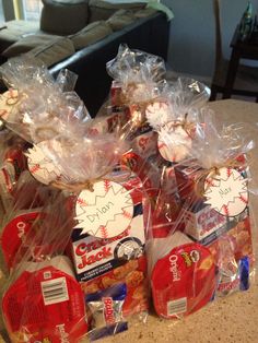 several packages of cookies wrapped in plastic on a counter