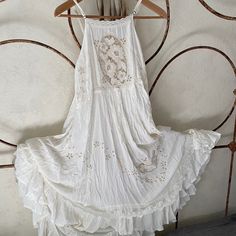 Excellent Vintage Condition Worn Once Less Trough Beige A-line Bohemian Dress, Bohemian Sleeveless Dress With Lace Trim, Bohemian Dresses With Lace Trim For Casual Wear, Bohemian Dresses With Lace Trim For Casual Occasions, Bohemian Beige A-line Dress, Chic White Sleeveless Embroidered Dress, Bohemian Sleeveless Embroidered Wedding Dress, Elegant Boho Dress With Lace Trim, Elegant White Boho Midi Dress