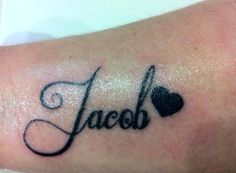 a tattoo with the word jalob written in cursive writing on it