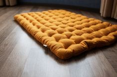 a close up of a mattress on the floor