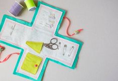 sewing supplies laid out on top of a table