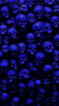 many blue skulls are in the dark and there is no image on this page to describe