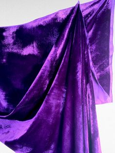 This vibrant purple velvet fabric is a vintage remnant from the 1970s, so it has a higher quality and richer texture. It has no stretch and drapes beautifully. The color is the true "royal" Tyrian purple that was reserved for kings and queens, as the dye was so rare and expensive. Made of rayon, it's 41" between the selvedges and sold by the yard.  Perfect for costumes, cosplay, wizard cloak, royal gowns, holiday crafts, Christmas decorations, stockings, or a special dress. I have other great vintage fabric from the same estate in my shop. Always happy to combine shipping. Purple Wizard, Purple Velvet Fabric, Wizard Cloak, Tyrian Purple, Wizard King, Royal Gowns, Special Dress, Vibrant Purple, Special Dresses