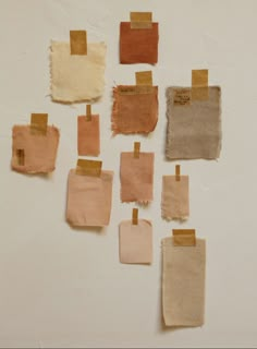 several pieces of cloth with brown and tan patches on them