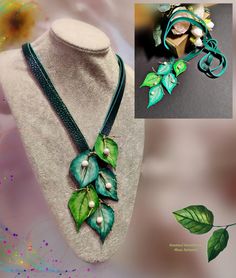 the necklace is decorated with green leaves and beads