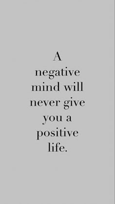 a negative mind will never give you a positive life quote on grey background with black and white lettering