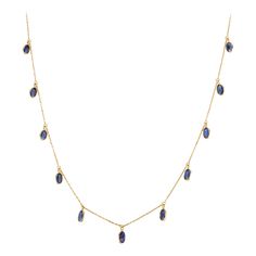 Minimalist Blue Sapphire Charm Necklace in 18K Gold studded with oval cut blue sapphire. This stunning piece of jewelry instantly elevates a casual look or dressy outfit. Sapphire stimulate concentration and reduces stress. Designed with a oval cut blue sapphire set in bezel settings dangling down the chain making a delicate fringe necklace to make you stand out of the crowd. This is a perfect Grandma Gift, Bridal Shower Gift, Mom Gift, Gift For Sister, Mother Daughter Gift, Bride To Be Gift, Br Sapphire Lariat Necklace, Gold Gemstone Necklace, Dressy Outfit, Mother Daughter Gifts, Chain Making, Ring Settings, Fringe Necklace, Necklace Craft, Gift For Sister