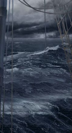 an image of a boat in the ocean with storm clouds above it and water below