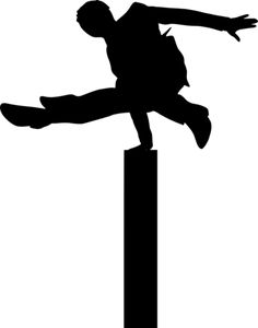 a silhouette of a man on top of a pole