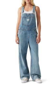 Revive a childhood favorite with roomy overalls cut from perfectly faded denim. Adjustable buckle straps; side button closures Bib pocket; front slant pockets; back patch pockets 100% cotton Machine wash, tumble dry Imported Oversized Overalls Outfit Fall, Levi's Denim Jumpsuit With Pockets, Medium Wash Relaxed Fit Overalls With Button Closure, Relaxed Fit Medium Wash Overalls With Button Closure, Medium Wash Relaxed Fit Bib Front Jeans, Medium Wash Overalls With Button Closure And Relaxed Fit, Casual Denim Overalls With Belt Loops, Levi's Denim Shortalls With Pockets, Levi's Denim Jumpsuit In Medium Wash