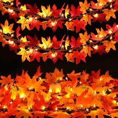 the fall leaves are lit up and ready to be used as decorations for an autumn party