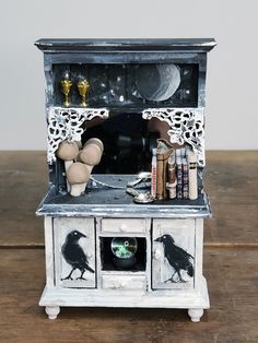 a small cabinet with some items in it