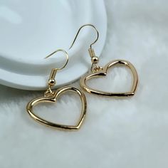 These Super Cute Dangle Earrings Feature Gold Tone Hearts. Also Available In Silver. Limited Quantities! Bundle & Save! Gold Jewelry Prom, Cute Dangle Earrings, White Hoop Earrings, Gold Heart Earrings, Patriotic Earrings, Hoop Drop Earrings, Gold Heart Earring, Dragon Earrings, Hoop Earrings Style