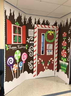 a door decorated with candy canes and christmas decorations on the front, side and sides