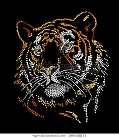 the head of a tiger is made up of small beads and sequins on a black background