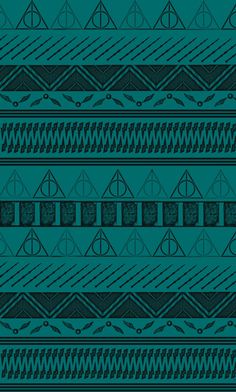 a blue and black wallpaper with geometric designs on the bottom, in different colors