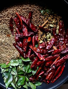 red peppers and other ingredients in a black bowl