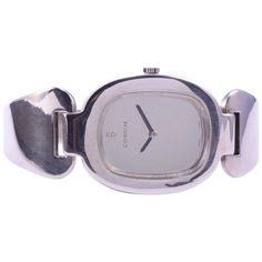 Vintage Swiss rare Corum sterling silver cuff wrist watch, circa 1970. This Corum sterling cuff wrist watch features a polished silver dial and 17 jewel movement #106825. Case #57300. This is a rare limited production wrist watch. [SSHO 888] Dimensions: 28mm H x 42mm W x 7mm D (case); 6″L x .80″W x .10″D Warranty: This watch comes with a full one year warranty from the date of purchase. Etsy Jewelry Rings, Solvang Ca, Silver Gift Wrap, Bangle Watches, Silver Jewelry Rings, Eternity Band Diamond, Silver Gifts, Hinged Bangle, Sterling Silver Cuff