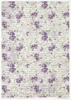 a purple flowered wallpaper with white and green flowers on the bottom right corner