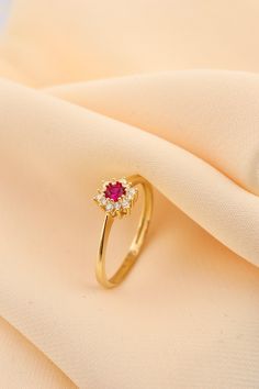 14k Solid Gold Daintly Flower Ring - Minimalist Wedding Ring - Anniversary Ring - Gold Floral Ring - Red Stone Flower Ring This solid gold dainty ring is made entirely from 14k solid gold. * Jewelry is packaged and shipped in a delicate jewelry gift box. * If you are purchasing it as a gift, please feel free to add a personal note. Anniversary, Gift For Wife, Christmas Gift Gold Kt: 14K solid gold * Available Gold Color:  * Guaranteed Authentic 14k Gold, Not Plated Or Filled * Stamp: 14K Gold Ring Designs Flower, Elegant Gold Flower Ring With Ruby, Wedding Stackable Ruby Rings In Gold, Dainty Red Diamond Promise Ring, Elegant Flower-shaped Birthstone Ring For Wedding, Red Flower-shaped Ring For Wedding, Red Flower Shaped Wedding Ring, Elegant Red Ruby Toe Ring, 14k Gold Flower Toe Ring For Wedding