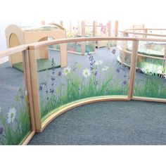 Create a unique nature-inspired toddler area! This 41"W x 24.25"H room divider is a gracefully curved clear acrylic panel that softens corners and features an inviting nature scene that brightens and defines any room environment while providing maximum child visibility and supervision. Use the connector panel accessory [included] to connect the panel to other pieces in our award-winning biophila inspired Nature View Collection [each sold separately] and create a flexible divided area layout in t Interactive Walls, Play Yard, Kids Area, Nature View, Indoor Playground, Acrylic Panels, Soft Seating, Grey Walls, Play Houses