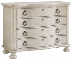 a white dresser with four drawers and knobs on the bottom drawer, in an antique style